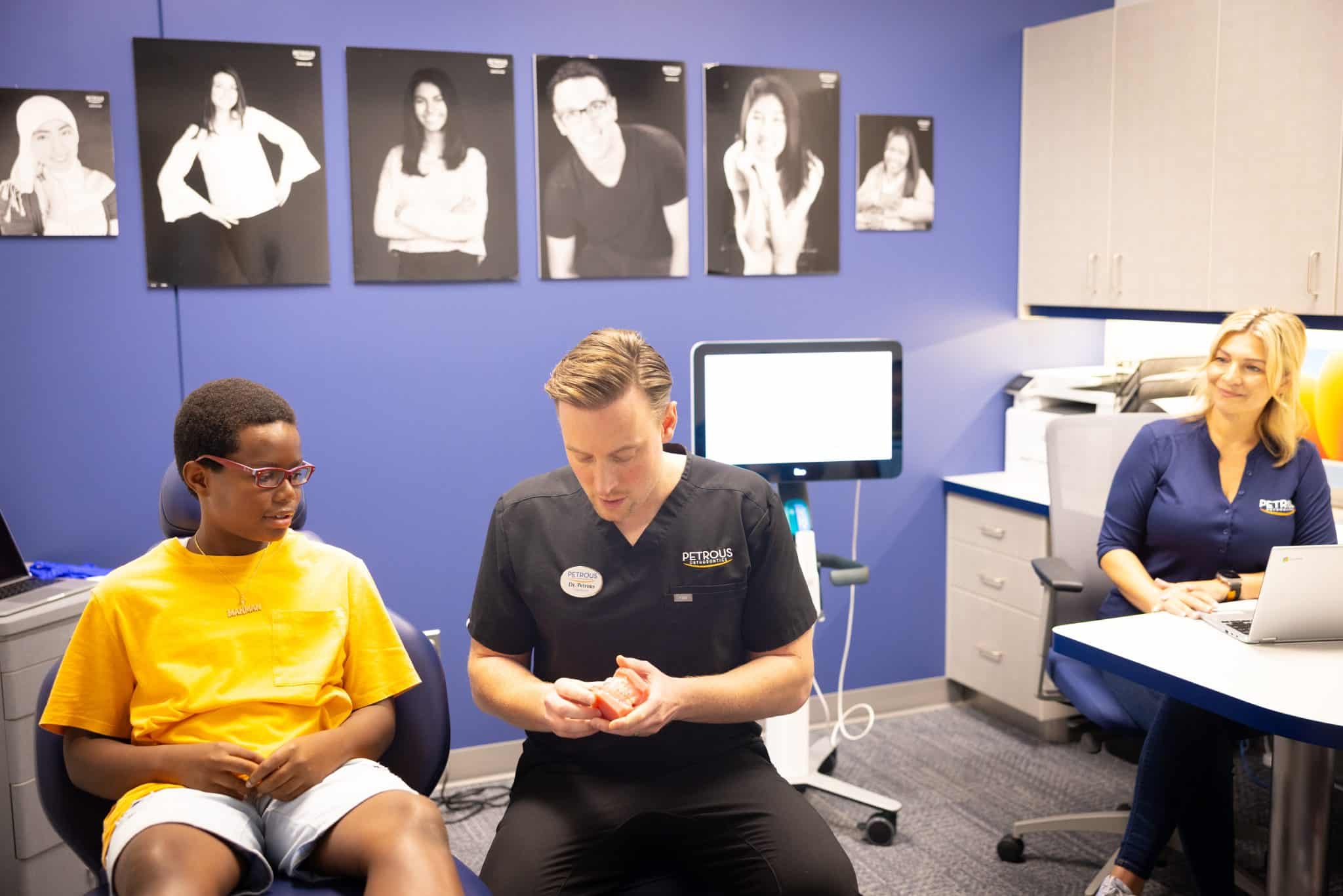 Orthodontist working with patient at Petrous Orthodontics in Royal Oak, MI